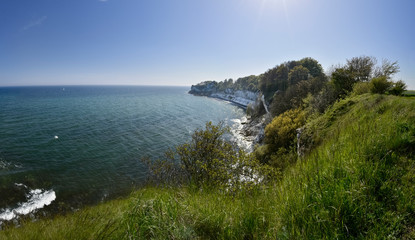 Fototapeta na wymiar Beautiful panorama of the coast of Stevns Klint in Denmark blue sky