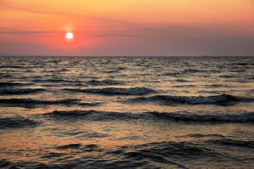 Colorful ocean beach sunrise. Dawn over the sea. Nature composition