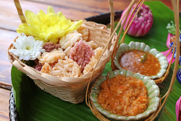 Thai Style Appetizer of Crispy Fried Rice Cakes with Sweet and Spicy Dips
