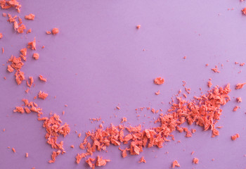 Violet background with small crumbs.