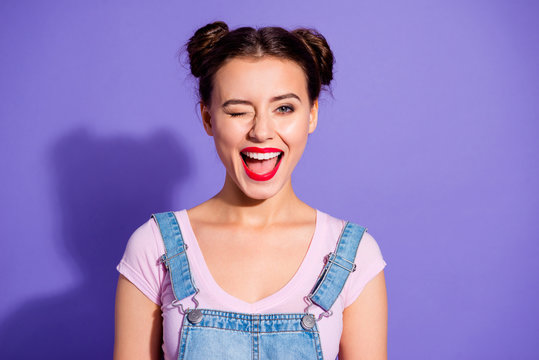 Close Up Photo Beautiful Amazing She Her Lady Two Buns Open Mouth Wink Boys Guys Cheerful Pretty Red Lips Pomade Wear Casual T-shirt Jeans Denim Overalls Clothes Isolated Purple Violet Background