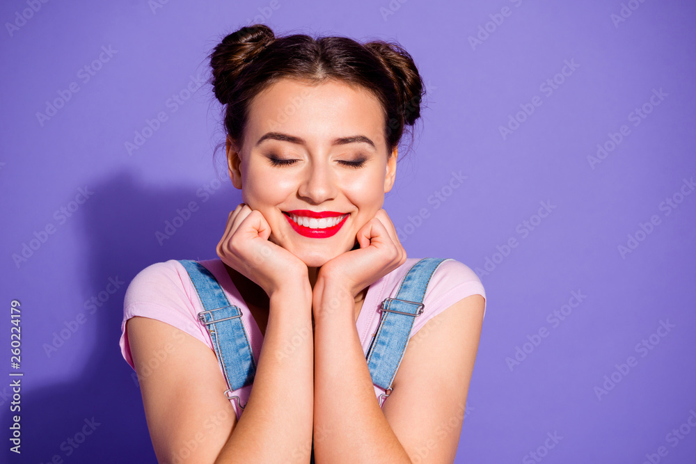 Sticker Close up photo beautiful amazing she her lady buns eyes closed head face lying hands arms show white teeth toothy wear casual t-shirt jeans denim overalls clothes isolated purple violet background