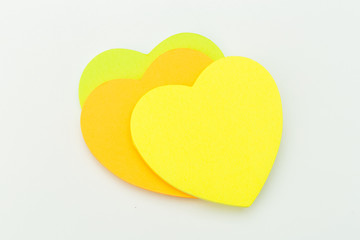  colour  paper heart stick note on a white background