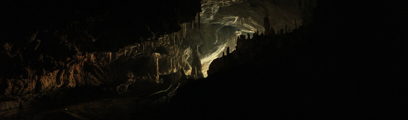 wide angle panoramic view showing the opening of a cave, Thum Lod cave, Bang Ma Pha, in Northern...