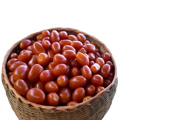 basket of red tomato and white background