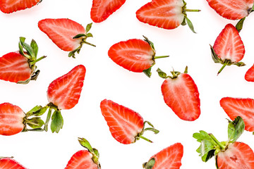 Fresh strawberry pattern. Sliced strawberries on white background, fruit flat lay.
