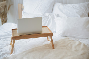 Laptop on the bed