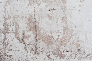 Wall fragment with scratches and cracks