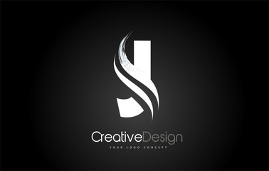 J Letter Design Brush Paint Stroke on Black Background