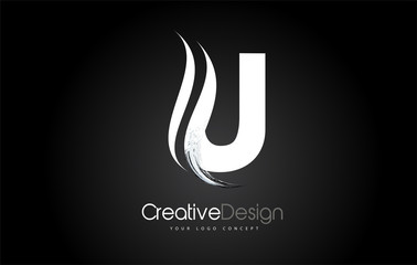 U Letter Design Brush Paint Stroke on Black Background