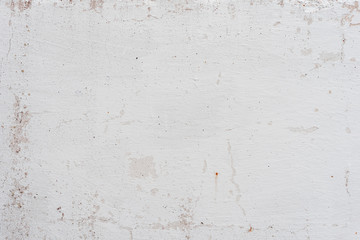 Wall fragment with scratches and cracks