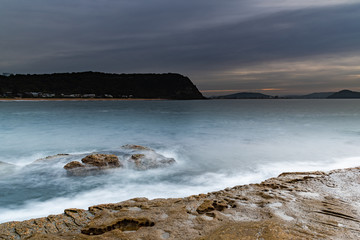 Soft High Cloud Sunrise Seascape from Rock Platform