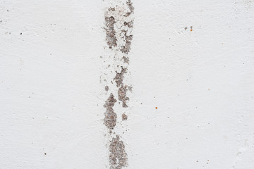 Wall fragment with scratches and cracks