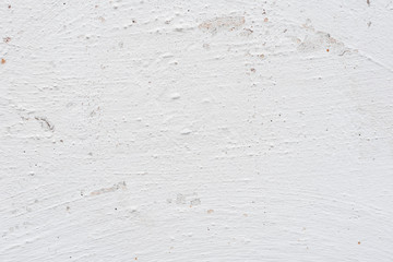 Wall fragment with scratches and cracks