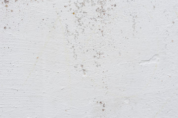 Wall fragment with scratches and cracks