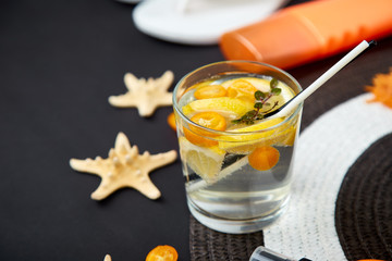 Holidays and drink concept. Cold cocktail, lemonade with lemon