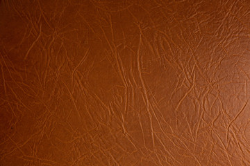 Fototapeta premium Texture of genuine leather close-up, brown color print. For your background, backdrop, with copy space 