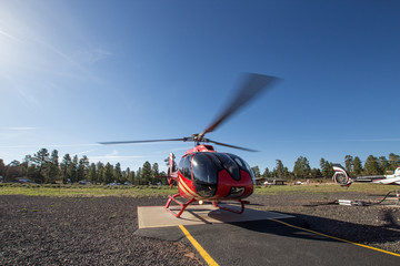 The helicopter is located on the take-off area with a running engine and a rotating propeller. © Кирилл Хрупалов