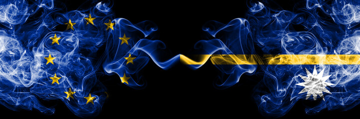 European Union vs Nauru smoke flags placed side by side. Thick colored silky smoke flags of EU and Nauru