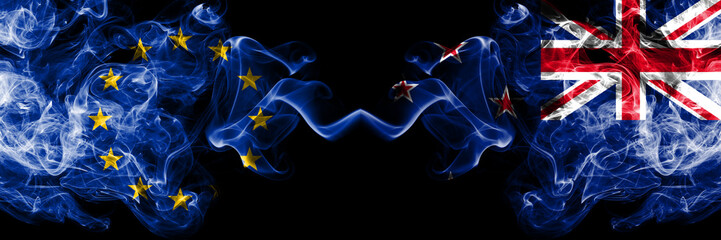 European Union vs New Zealand, New Zealander smoke flags placed side by side. Thick colored silky...