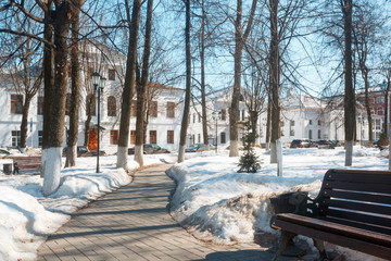 Paved path in the city Park in winter.