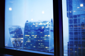 landscape skyscrapers night / business center in a night landscape, winter lights in the windows of houses in the business district