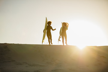 Female surfers at the beach