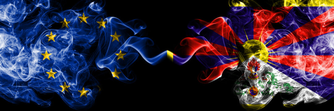 European Union vs Tibet, Tibetan smoke flags placed side by side. Thick colored silky smoke flags of EU and Tibet, Tibetan