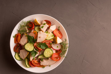 Chicken Breast, Cucumber Radish and Tomato Salad with Greens