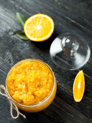 Home cosmetics for body care. Orange scrub with sugar