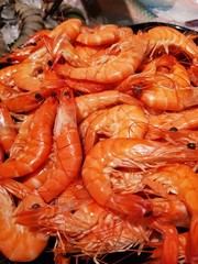 Boiled sea shrimp on the counter background