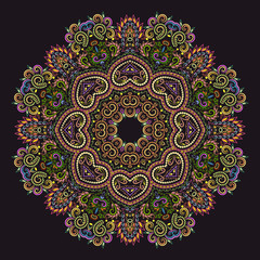Beautiful ethnic round pattern with traditional elements. Ornamental geometric colored painting on the plate. Vector print.