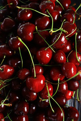 plate with cherry background / beautiful bright background fresh cherry cherries, juicy fruit