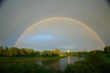 Fototapeta na wymiar summer landscape with a rainbow