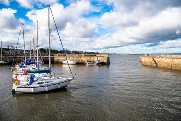 Fototapeta na wymiar Sailboats anchored in a Harbour on a Sunny Autumn Day