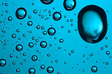 fresh drops background blue glass / wet rainy background, water drops transparent glass blue