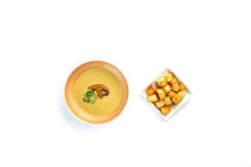 mushroom cream soup and crackers on an isolated white background