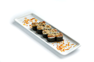 Obraz na płótnie Canvas set sushi on a rectangular plate on an isolated white background