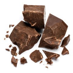 Dark or milk organic chocolate pieces isolated on white background
