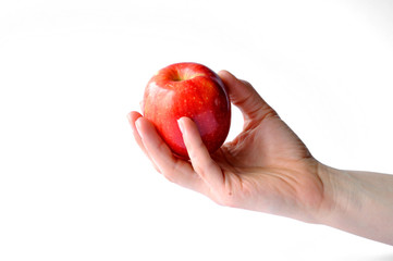 red apple in hand isolated on white background