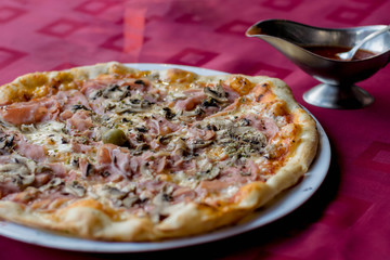 Pizza with tomato sauce 