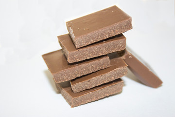 pieces of milk chocolate stacked on top of each other