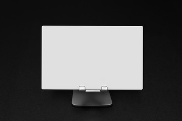 blank white paper sheet on a stand with copy space