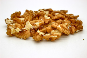 Walnut Kernels (Other Names: Juglans Regia, Persian Walnut, English Walnut, Circassian Walnut). Isolated Image On A White Background
