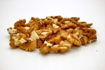 Walnut Kernels (Other Names: Juglans Regia, Persian Walnut, English Walnut, Circassian Walnut). Isolated Image On A White Background
