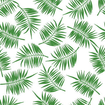 Tropical seamless pattern with green palm leaves.