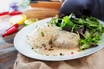 Veal Paupiette stewed with cream and rice