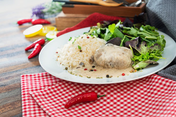 Veal Paupiette stewed with cream and rice