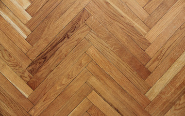Wooden parquet floor background of oak hardwood texture in apartment building. Interior design with...