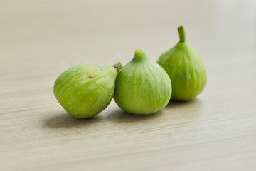 Ripe figs on a on a wooden table